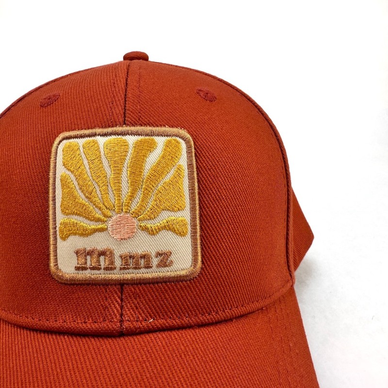 Casquette Trucker Le soleil brulant, blason brodé
